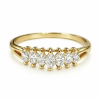 14 carat yellow gold ring set with diamonds in a marquise polish in a stepped setting